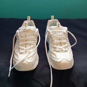 Skechers woman's white with gold size 6